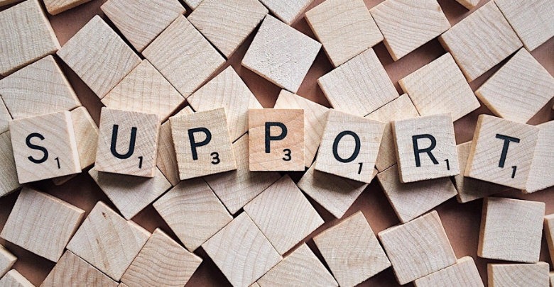 Blocks spelling out support