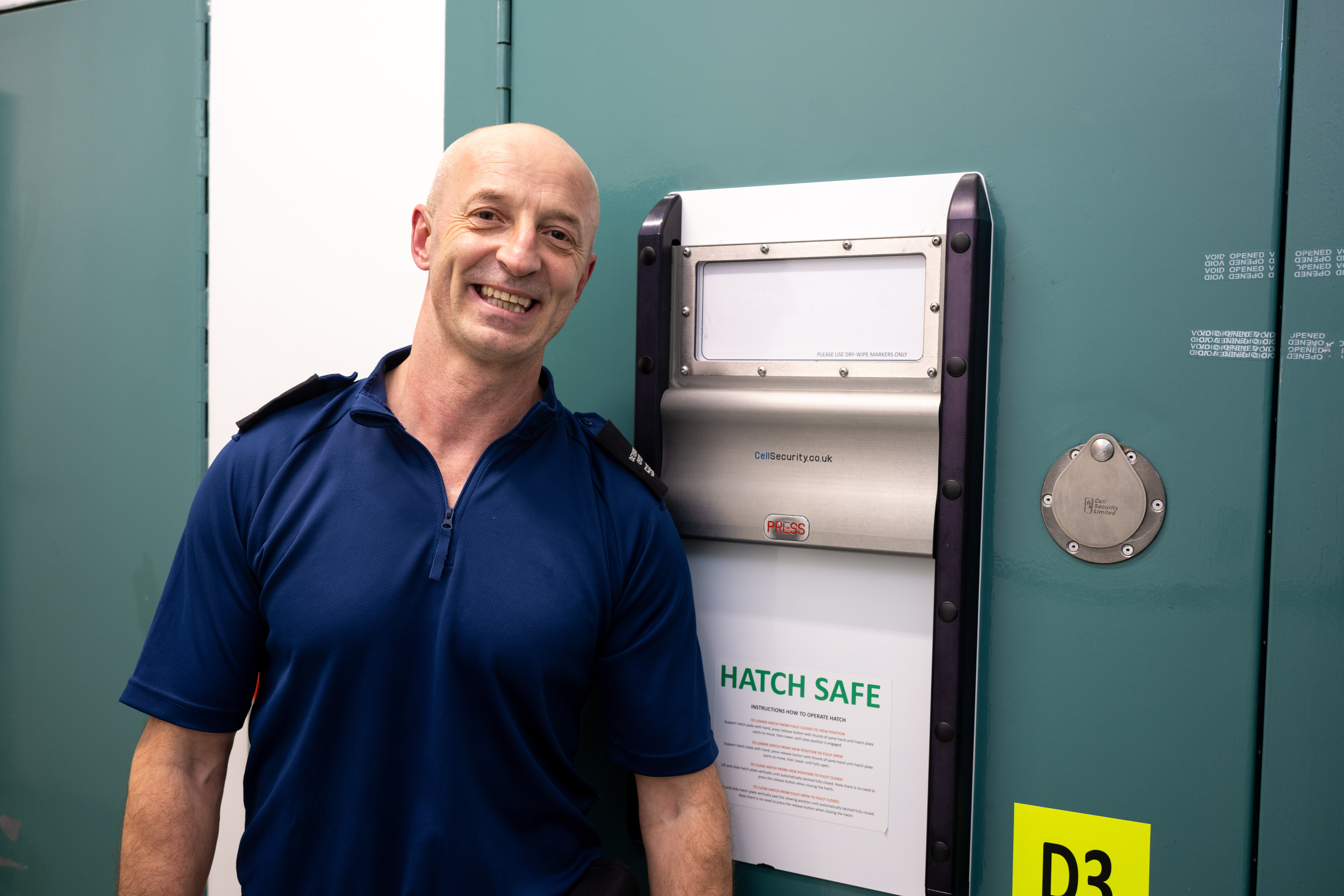 Male Detention Officer smiling
