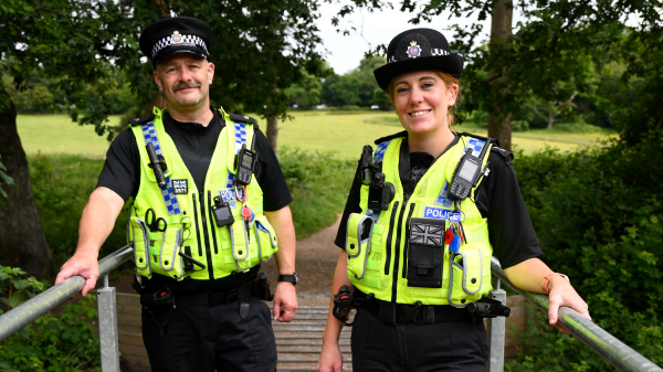 Male and Female Special Constables smiling