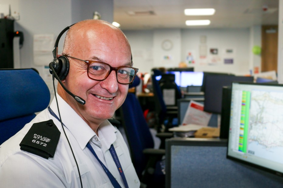 Male contact officer smiling to the camera