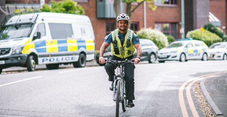 A PCSO riding a bike